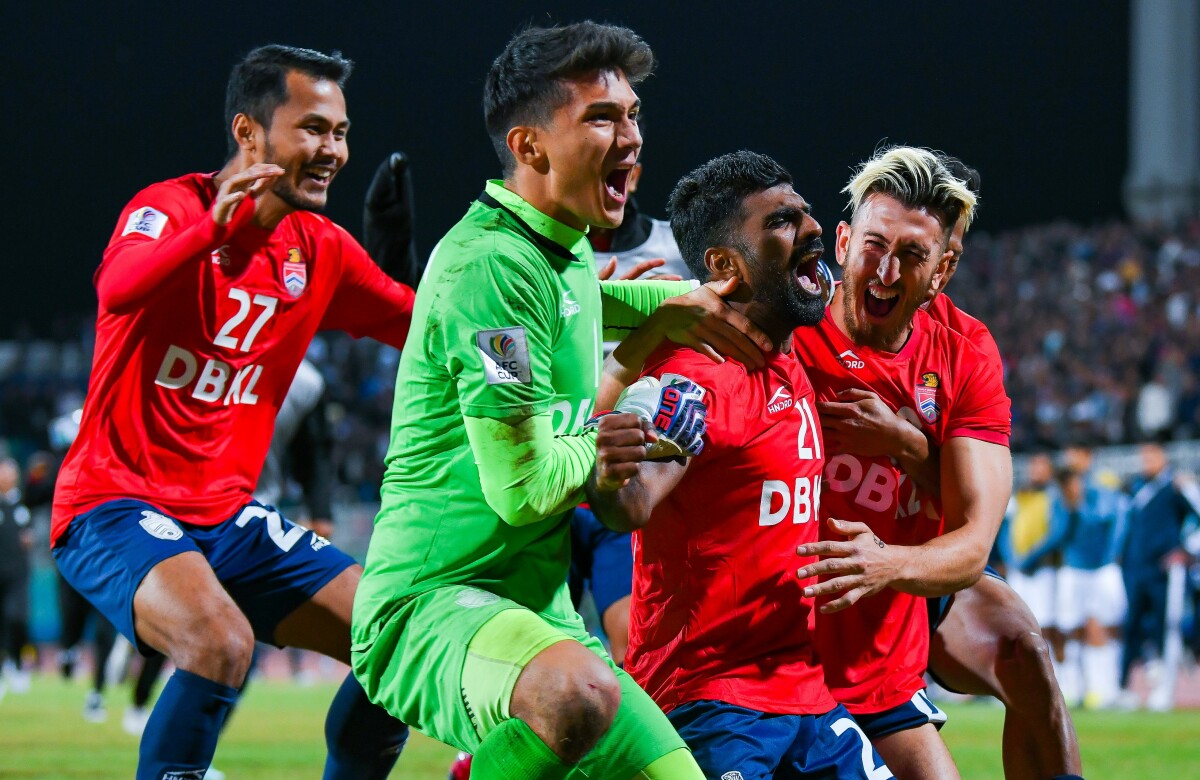 Al Seeb Club players and officials celebrate victory after the AFC Cup 2022  Final match between